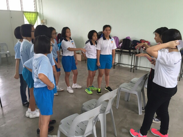 Seniors explaining the rules and regulations of the games.
